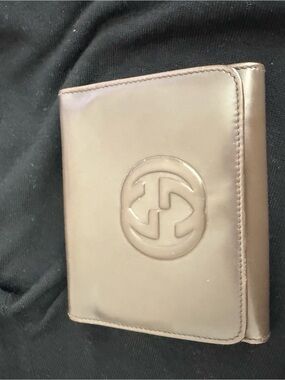 Gucci Brown Leather Bifold Wallet with Embossed Logo